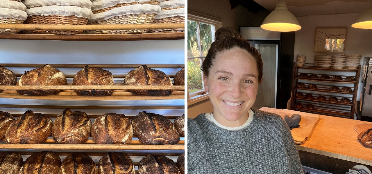Freshly baked artisan sourdough loaves stacked on wooden racks at Pennyloaf Bread Co., alongside baker Jessica Sherrow in her cozy kitchen.