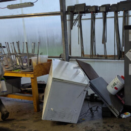 Seed storage cooler displaced and tilted after flood damage